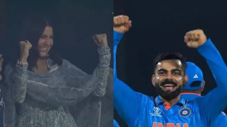 Virat Kohli celebrates after taking his first World Cup wicket