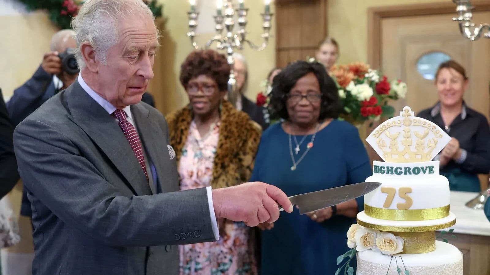 King Charles cuts his birthday cake
