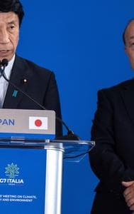 Japan's Minister of Economy Ken Saito, left, and Japan's State Minister of the Environment Tetsuya Yagi take part in the G7 Climate, energy and environment press conference at Venaria Reale in Turin, Italy, Tuesday April 30, 2024. 